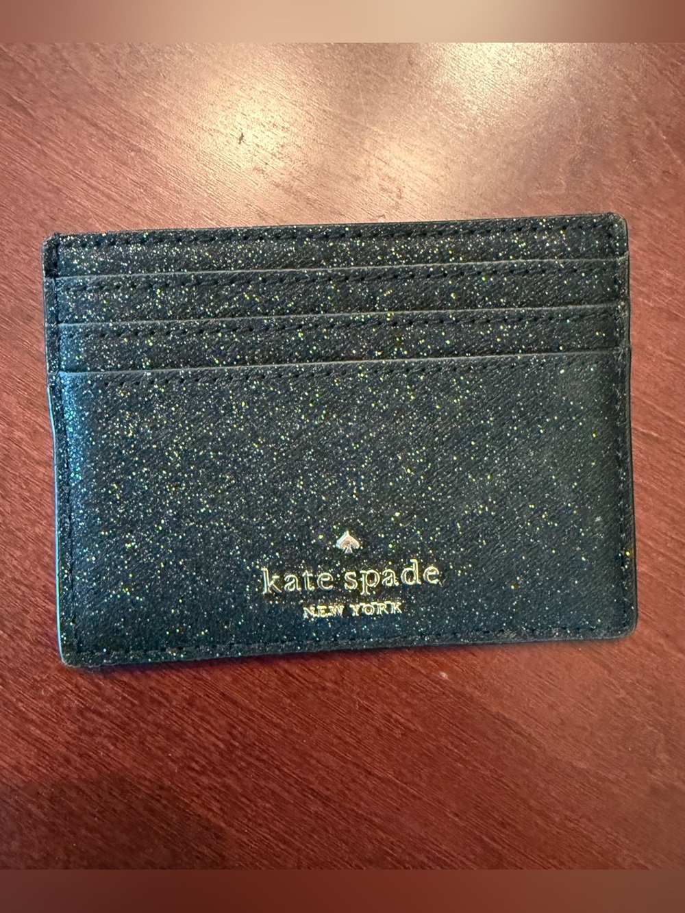 kate spade Black Glitter Card Sleeve with Gold Logo